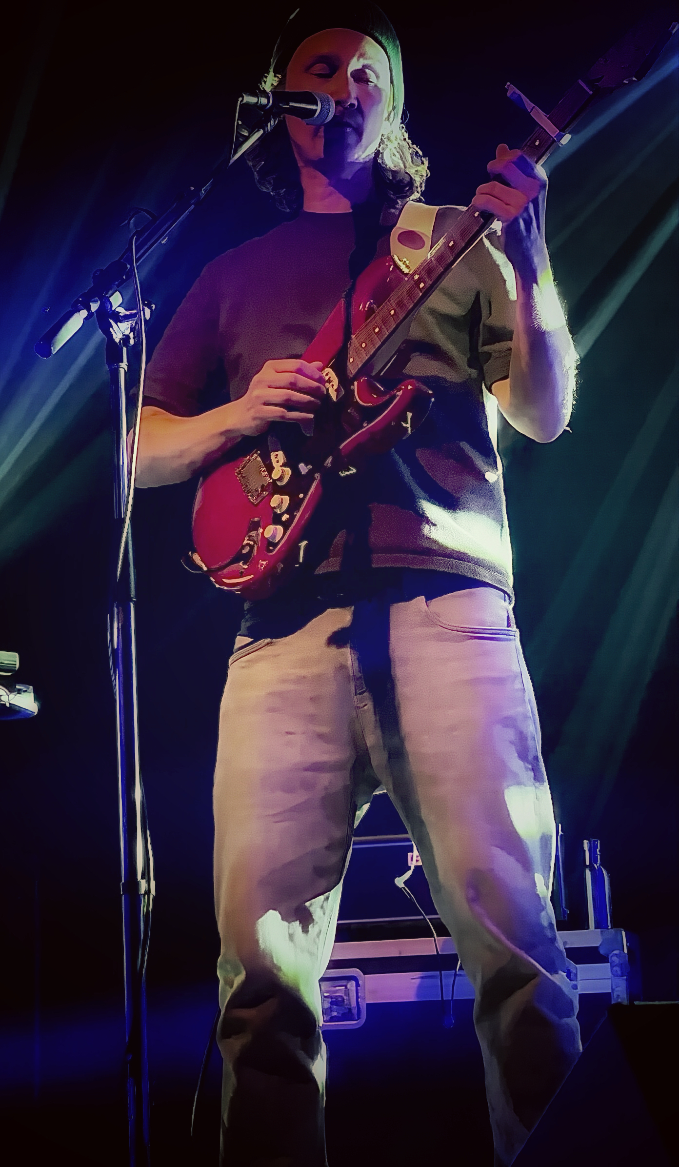 Guitarist with red guitar